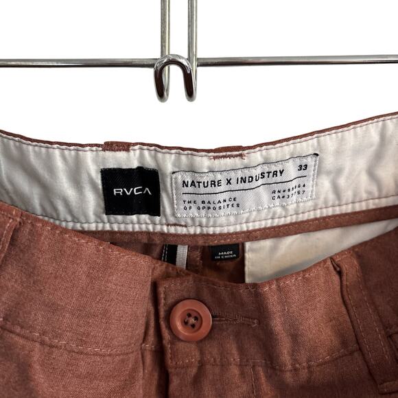 pair of RVCA men's chino shorts in a rust or red color with a size 33 waist - Picture 2 of 3